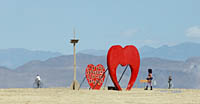 Two red hearts art display in Black Rock City