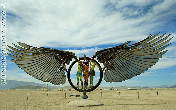 Burning Man Painted Metalic People
