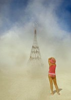 Burning Man Girls taking pictures of Elevation Tower by Michael Christian
