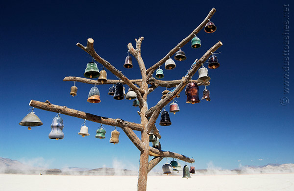 sounding bells hanging on the tree art sculpture