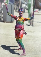 Red, green, yellow body painted woman