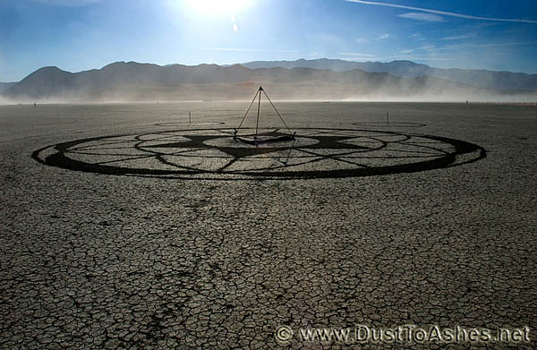 Creative geometric circle on the surface of playa desert
