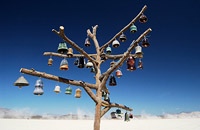 Ceramic bells hanging on a Tree art sculpture