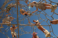 People climbing art installation at Burning Man