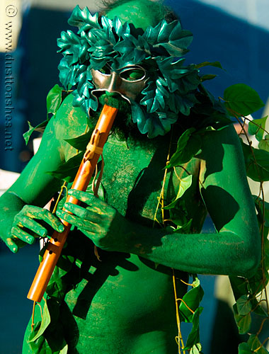 Green Leafy Body Painted Man with Flute | Dust to Ashes