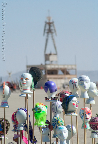 Colored styrofoam heads art in front of the Man