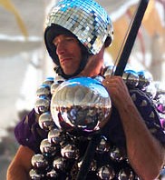 Man in Center camp dressed in ball suit