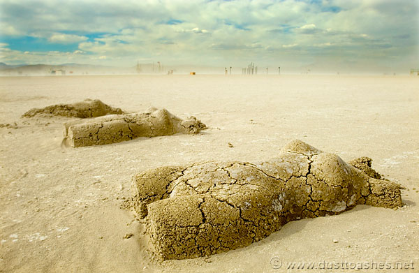 Dust to Dust clay  torsos art in desert by RIck Roelke
