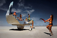 Burning Man people dancing around the interstellar ship