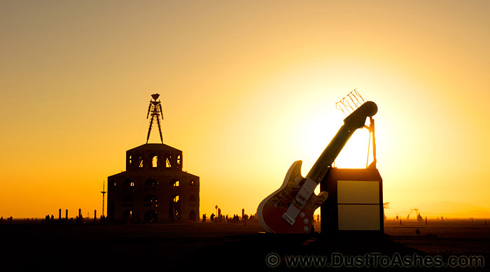 Sunrise silhouette of guitar