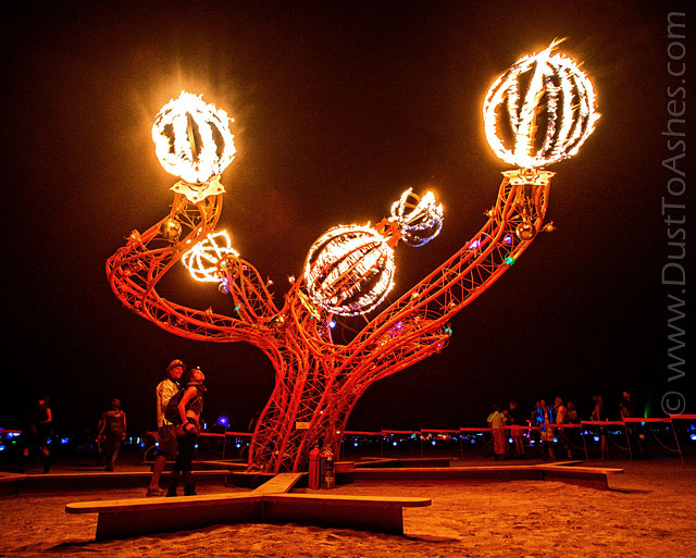 Spinning fires on the tree sculpture