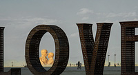 Welded art of LOVE giant metal letters