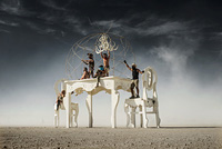 White kitchen table in desert art installation