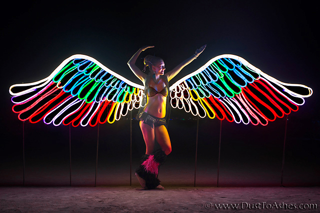Burning Man girl in the night costume