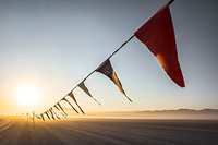 colorful flags decorating the road to Burning Man