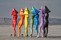 Seven mannequins painted with rich colors decorated as a Lamps