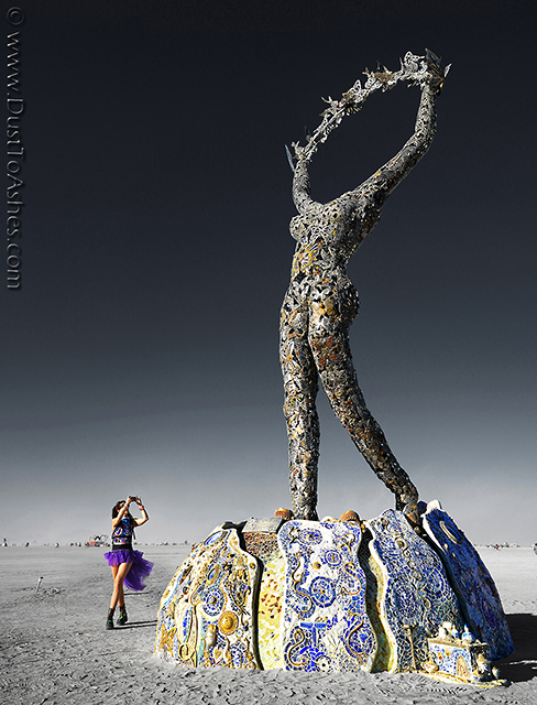 Large Art installation of headless female rising her arms and releasing the butterflies. Created by Dana Albany